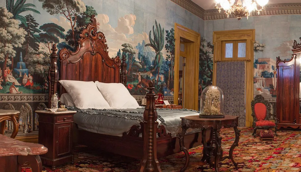 An opulent vintage bedroom with a large wooden bed elaborate tapestries and antique furniture