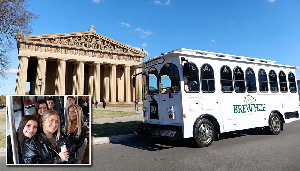 A trolley-style bus marked Music City BrewHop is parked in front of a building with classical Greek architecture