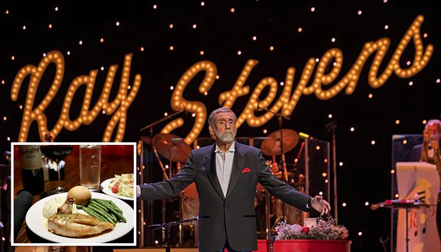 A man stands on stage with arms outstretched in front of a lit sign that displays the name Ray Stevens, with musicians in the background.