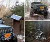 A rugged off-road vehicle equipped with roof-mounted gear is parked in a woodland area near a simple wooden structure with a solar panel on its roof