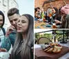 Four friends are sharing a meal and enjoying each others company on a city street