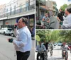 A group of men are engaged in a conversation on a street with colorful buildings two of whom are on bicycles