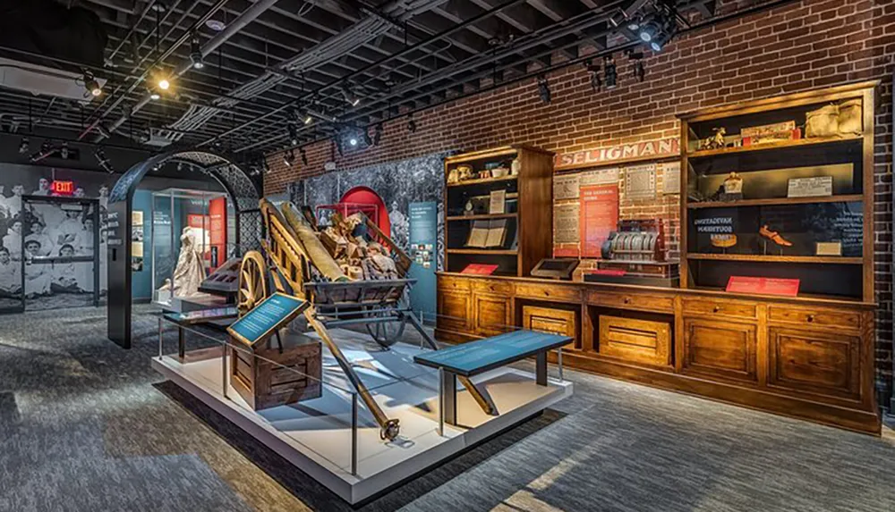 This image shows an exhibition space within a museum featuring historical artifacts and informational displays