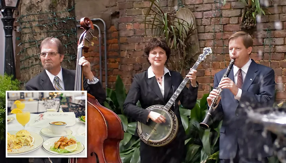 A trio of musicians play instruments in an outdoor setting with an inset of a table featuring a plate of food and a drink