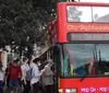 A group of people are walking by a red double-decker CitySightseeing bus with a Hop-On Hop-Off sign