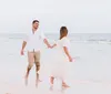 The image is a collage of six beach-themed photos including scenes of a woman with an American flag a marriage proposal a family portrait a surprised woman a group of bridesmaids and a couple enjoying a romantic moment