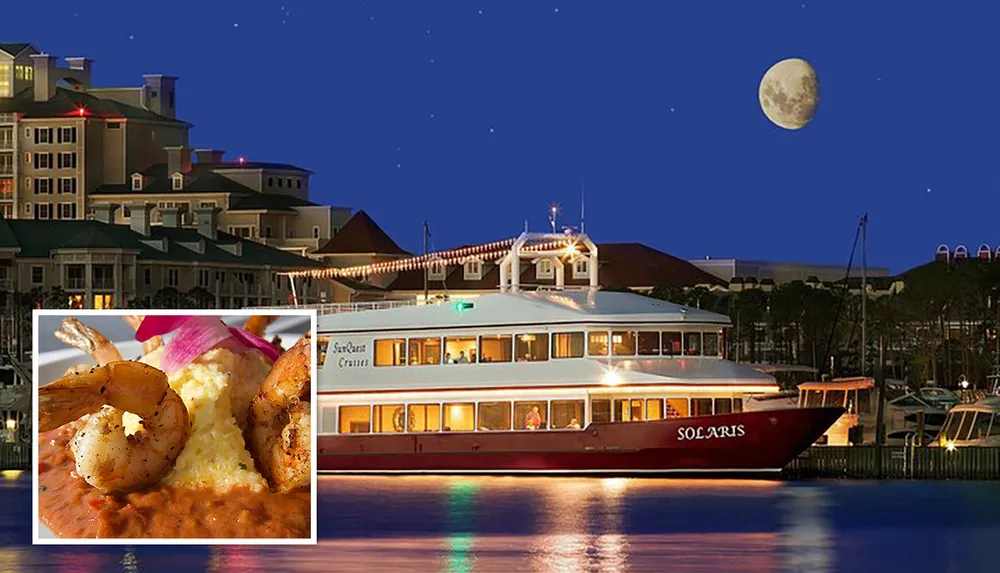 The image shows an evening scene with the Solaris yacht docked in a marina with a close-up inset of a dish that appears to be shrimp and grits all set against a backdrop of a coastal resort town under a moonlit sky