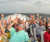 A group of happy people is enjoying a sunny boat ride on a clear blue water body