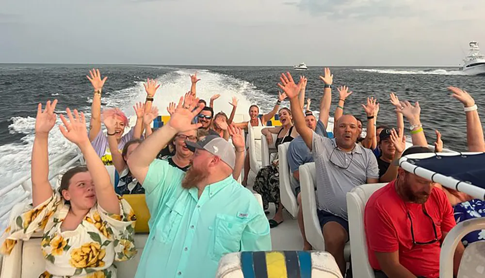 A group of people are raising their hands in excitement on a boat expressing joy while one person in the foreground appears less enthused