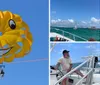Three people are enjoying a parasailing adventure skimming over the water in a moment of fun