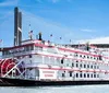 The image is a split-view featuring a vintage-style trolley streetcar on the left and the Georgia Queen riverboat on the right representing contrasting modes of transportation