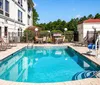 Outdoor Swimming Pool of Comfort Inn  Suites Savannah Airport