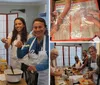 Three smiling people likely a family are wearing aprons and tasting food in a kitchen setting