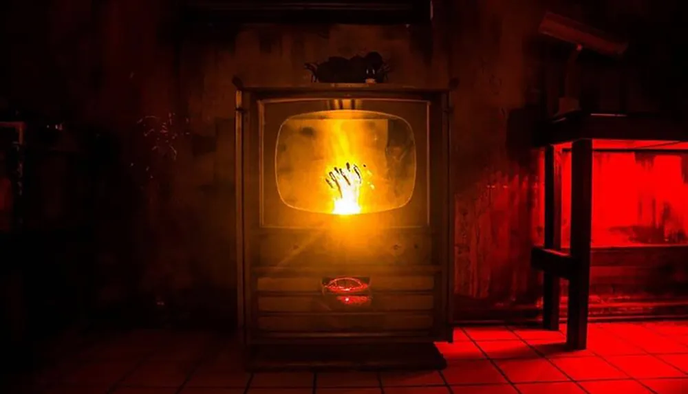 The image shows a surreal scene with silhouettes of hands pressing against the glass of an old-fashioned stove or furnace glowing with a yellow light all bathed in a sinister red ambiance