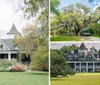 An elegant two-story house with a conical roof feature is nestled among large trees draped with Spanish moss overlooking a well-manicured lawn