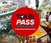 The image is a promotional collage for the Tour Pass Charleston featuring a ferry boat people gazing at a statue amidst trees and an elegant staircase suggesting a variety of tour experiences available in Charleston