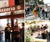 People are enjoying pizza outside Landinis Pizzeria under a warmly lit sign