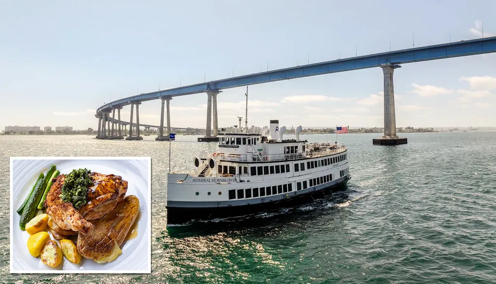 A white ship named Admiral Hornblower sails under a large bridge with a plate of roasted chicken and vegetables inset in the foreground