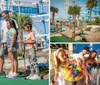 A family of four is enjoying a game of mini-golf on a sunny day with a ferris wheel and other attractions in the background