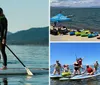 A group of people are enjoying paddleboarding and kayaking on a sunny day on a clear body of water with mountains in the background