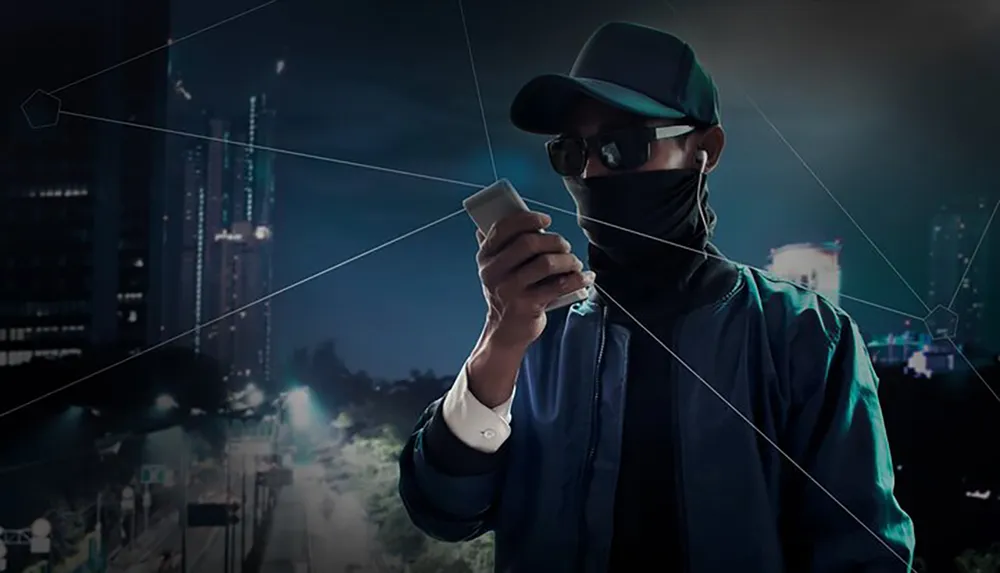 A person wearing a cap sunglasses and a face mask is holding a smartphone in an urban night setting with graphical overlays suggesting technology or data connections