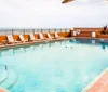 Outdoor Swimming Pool of Quality Inn  Suites On The Beach - Ormond Beach FL