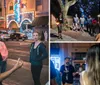 A group of people appear to be engaged in a conversation on a city street at night with illuminated buildings in the background