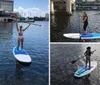 Two people are standing on paddleboards holding their paddles aloft on a calm water surface