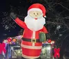 A child in a Santa hat looks out a window at a brightly lit Ferris wheel at night with a quote saying BEST experience in Pigeon Forge attributed to Angela