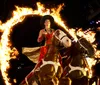 The image features three people in cowboy attire riding horses and holding American flags with an inset of a hearty meal and the text Great show Great food with a Yelp logo