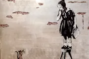 A monochromatic stencil graffiti artwork depicts a young girl on a raised platform apparently speaking on a phone while a small rat looks on from below.