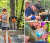 Two people are closely examining an object on top of a set of black boxes labeled with numbers suggesting they might be engaged in some kind of outdoor activity or challenge