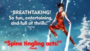 The image shows an aerial performer on silk ropes set against a snowy background with reviews praising the show as 